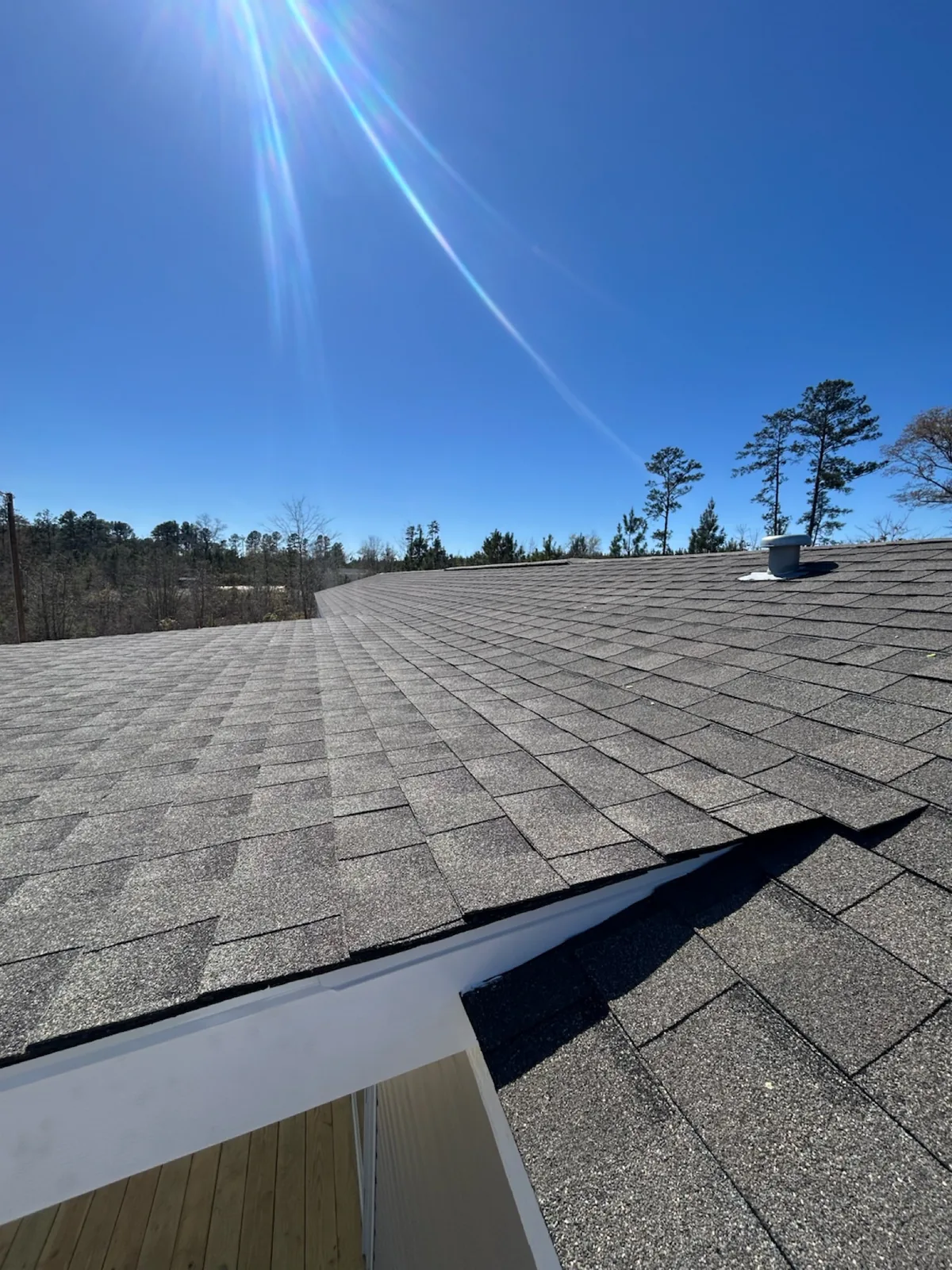 Shingled porch roof showing the connection to the manufactured home roof.